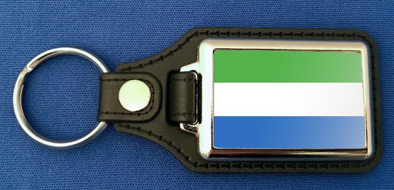 Sierra Leone Schl&uuml;sselanh&auml;nger aus Metall und Kunstleder | ca. 95 X 37 mm - Bild 1