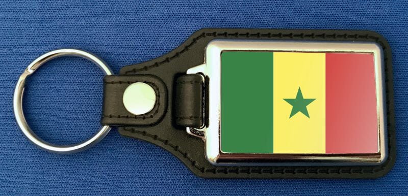 Senegal Schl&uuml;sselanh&auml;nger aus Metall und Kunstleder | ca. 95 X 37 mm - Bild 1