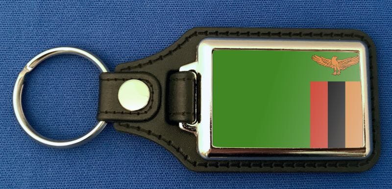 Sambia Schl&uuml;sselanh&auml;nger aus Metall und Kunstleder | ca. 95 X 37 mm - Bild 1