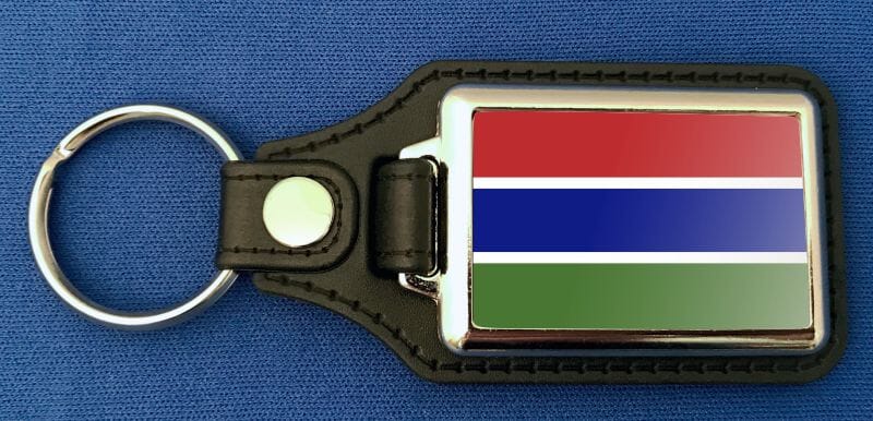Gambia Schl&uuml;sselanh&auml;nger aus Metall und Kunstleder | ca. 95 X 37 mm - Bild 1